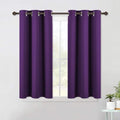 NICETOWN Thermal Insulated Blackout Draperies Curtains, Triple Weave Home Decoration Solid Ring Top Blackout Drape Panels for Bedroom (Set of 2, 42 x 45 Inch, Royal Purple)